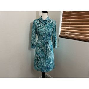Large blouse dress polyester beautiful water print perfect for office wear. Item